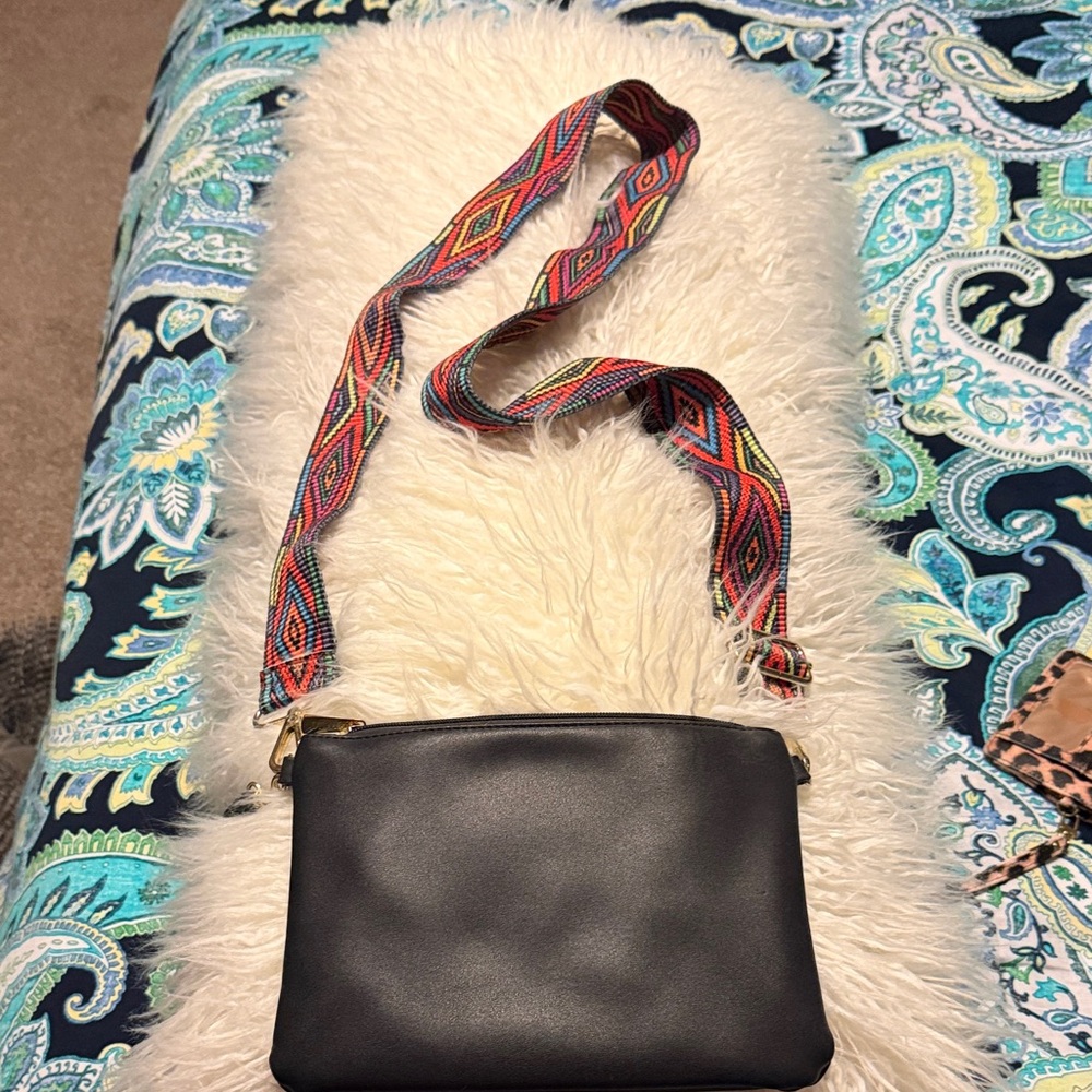 Stylish Black Crossbody Bag with Colorful Woven Strap